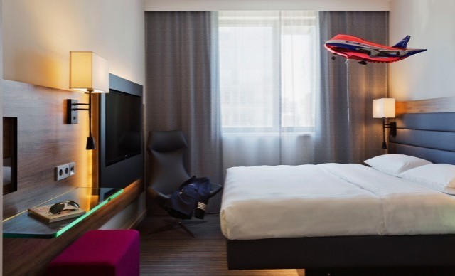Interior view of a hotel room at the Moxy