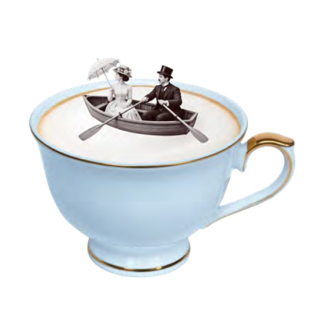 A vintage Victorian couple in a rowing boat, floating on the latte foam inside a pale blue and gold-trimmed teacup. A quirky composite image.